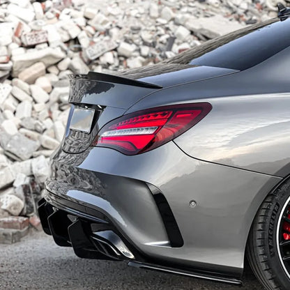 Split Central Para-Choques AMG Mercedes W117 Cla

4 Fins Glossy Black Car Rear Bumper Diffuser Rear Side Splitters Spoiler Lip For Mercedes Benz C117 CLA45 AMG Line 2016-2019