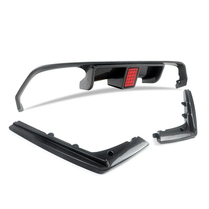 Difusor com stop F1 EM Carbono (Aquaprint)  BMW F80 M3 F82 F83 M4 2015-2020 

Carbon Fiber Look Rear Diffuser Lip W/Light For BMW F80 M3 F82 F83 M4 2015-2020